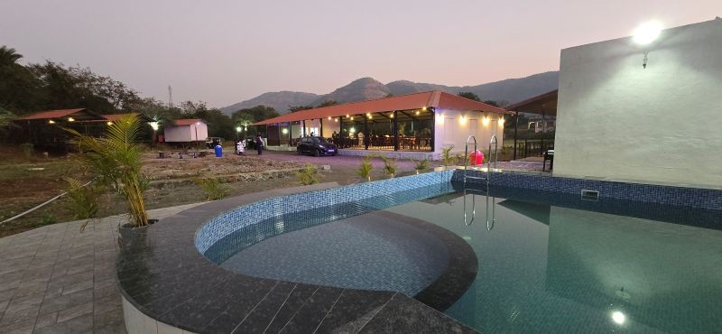 https://d3w73813efcbi.cloudfront.net/tenants/amrutvelresort/rooms/group-haven.jpeg